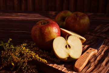 Fresh apples on old background