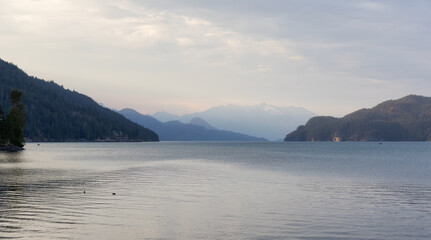 Harrison Lake with Canadian Mountain Landscape. Sunny Summer Sunset Sky. Harrison Hot Springs, British Columbia, Canada. Nature Background.