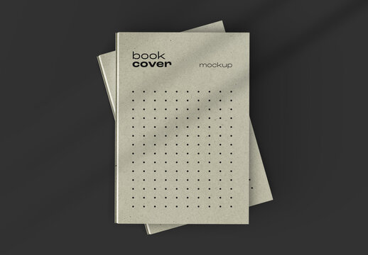 Overlapping Hardcover Book Mockup with Dynamic Shadows and Elegant Layout on Dark Background for Sophisticated Publishing and Editorial Projects