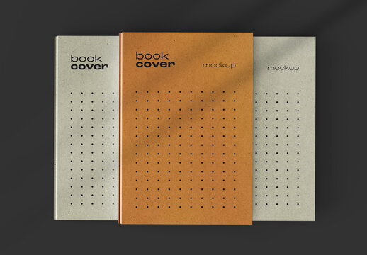 Flat Laid Book Cover Mockup Featuring Three Hardcover Books on Dark Background for Modern Publishing Design and Creative Branding Presentations