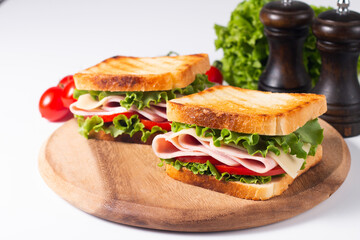 Close-up photo of an American club sandwich. Fast food concept. 