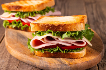 Close-up photo of an American club sandwich. Fast food concept. 