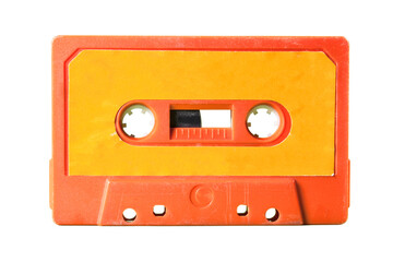 An old vintage cassette tape from the 1980s (obsolete music technology). Vivid colors: coral red...