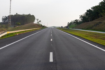 Fototapeta na wymiar road with central lane division lanes