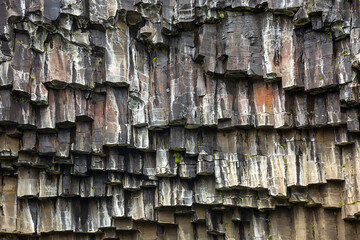 Texture of hexagonal black lava columns.