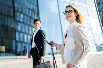 Employees economists work in a financial company in a bank communicate on a new project