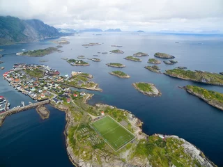 Zelfklevend Fotobehang Henningsvaer - fishing village in Lofoten, Norway famous for its beautifully located football pitch © Mariusz Świtulski