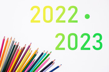 2022 2023 school year with heap colored pencils isolated on white background. Banner. Creative development and education of preschoolers, children and adults. Art stationery shop card. Year color