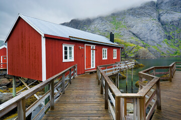 Fishing village with traditional red rorbu in Nusfjord, Lofoten, Norway