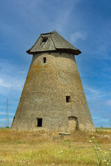 Fototapeta na wymiar Abandoned Windmill Melenci