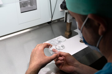 Embryologist adding labels frozen and ovulated sperm in laboratory of reproductive clinic. in vitro...