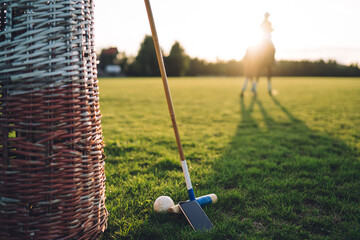 Polo stick ball and smartphone left on playing field by rider