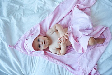 Fototapeta na wymiar A small newborn baby girl. The concept of childhood