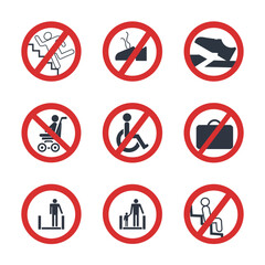 Set of accident prevention signs on escalators.
