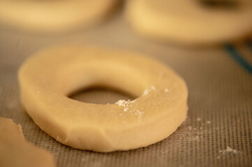doughnut with flour just before being backed