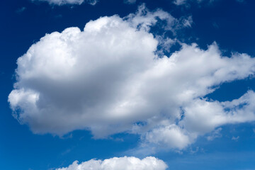 Naklejka na ściany i meble Blue sky with beautiful clouds