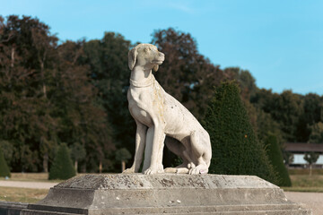 Fototapeta na wymiar White statue of a dog.