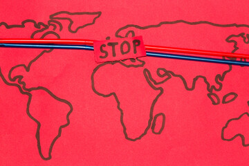 red map of the world with a stop on the gas pipeline, world energy crisis
