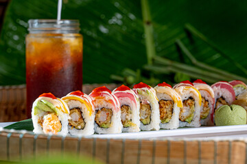 Assorted Colorful Sushi Rolls or Uramaki with Thai Tea