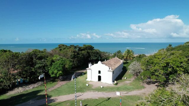 Aerial view of Trancoso, Porto Seguro, Bahia, Brazil. Small chapel in the historic center of Trancoso, called Quadrado. With the sea in the background.