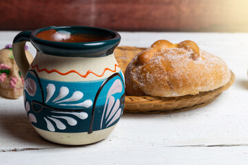 traditional cup of mexican coffee and bread of the dead