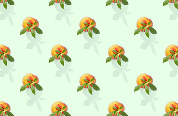 Pattern of peaches on green pastel background