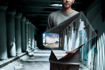 person holding a square frame with a backround painting, surreal creative concept