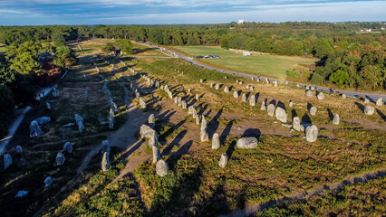 Fototapeta na wymiar Aerial view of the Carnac stone alignments of Kermario in Morbihan, France - Prehistoric menhirs and megaliths in rows in Brittany