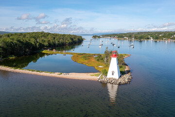 Aerial view of the lighthouse on Bras D'Or lake near Baddeck, Nova Scotia Canada
