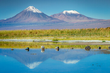 Licancabur volcanic landscape and salt lake reflection in Atacama Desert, Chile