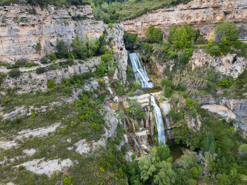 View from drone on waterfall on Sant Miquel del Fai in the Spain.