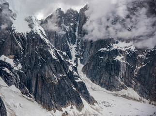 Mountains with Glacier and Clouds
