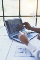 Construction and structure concept of engineer working drawing on blueprint meeting for project...