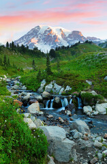 Myrtle Falls and Mt Rainier at sunrise. Myrtle Falls is located along Skyline Trail in the Paradise area of Mount Rainier National Park and is reached by hiking the trail 0.5 miles.