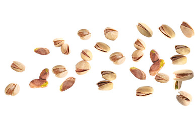 Many flying pistachios isolated on white