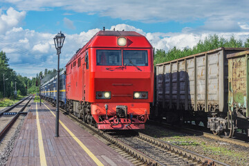 Fototapeta na wymiar Touristic train stands by the platform.