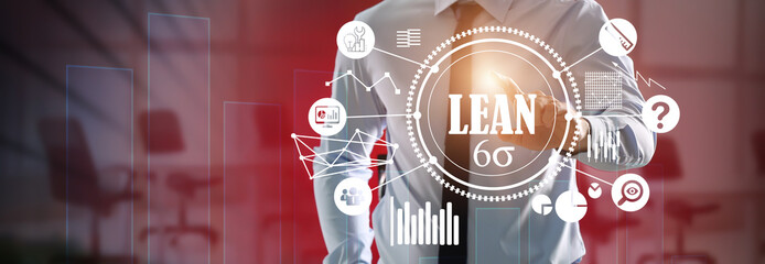 Businessman using virtual screen on dark background. 6 sigma concept