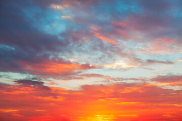Naklejka na ściany i meble Colorful dawn heaven . Vibrant sky with clouds