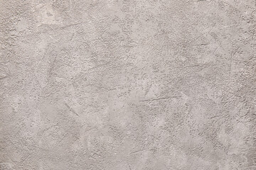 Grey grunge wall as background, closeup