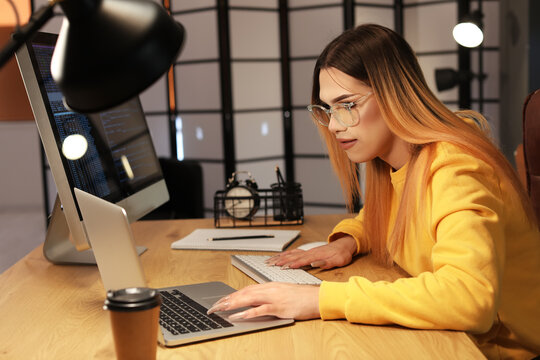 Transgender programmer working in server room