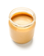Jar of tasty nut butter on white background