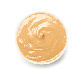 Bowl of tasty nut butter on white background