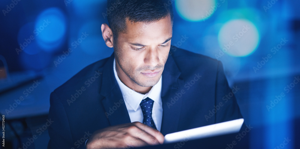Poster businessman with digital tablet overtime for data research in a corporate office at night. male entr