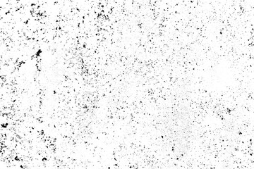 Scattered black stains and scratches on a white wall surface