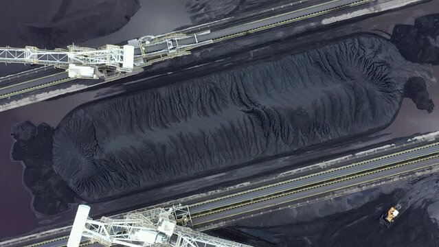 Coal terminal with technics working in it.