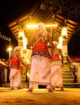 Kataragama, Sri Lanka - 08 06 2022: Tusker elephant and performing rituals in Esela Perahara in Ruhunu maha kataragama dewalaya with the traditional drummers music.