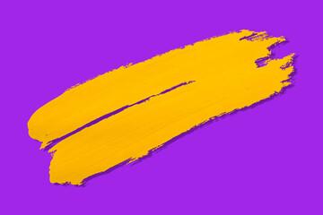 Fototapeta premium yellow brush and shadow isolated on a purple background