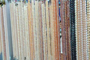 Pearl necklaces sold by vendors in tourist areas