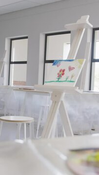 Video of school class with easels prepared for art lessons