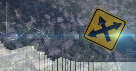 Image of financial data processing over road sign and cityscape